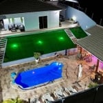 Casa na Praia,com 3 Dorm. e Piscina. aceita Financiamento Porteira  FECHADA