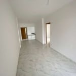 Apartamento com 2 dormitórios à venda, 65 m² por R$ 430.000,00 - Caiçara - Praia Grande/SP