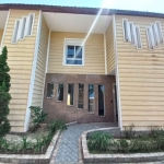 Casa com 3 dormitórios à venda, 152 m² por R$ 1.012.000,00 - Mirim - Praia Grande/SP