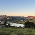 Paraíso Natural: Terreno de 5.700m² com Vista Deslumbrante para a Represa e Montanhas.