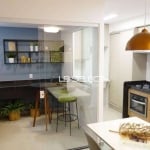 Apartamento no bairro Shopping Park com dois quartos, suíte e varanda gourmet.