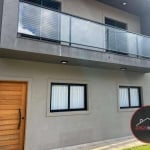 Casa com 2 dormitórios à venda por R$ 1.000.000 - Indaiá - Bertioga/SP