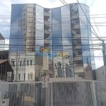 Prédio comercial de 551 m² no centro, com 3 andares e elevador.