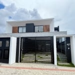 Casa com 3 suítes sendo principal com closet e sacada, 206 m2 privativos, no Bairro Saguaçu