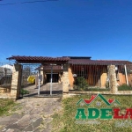 Casa para Comprar na Zona Sul de POA/RS | Imóvel constituído de casa com 3 dormitórios (sendo 1 suíte), com banheiro, sala, cozinha, pátio e garagem coberta. Em boa localização, próximo de comércios l