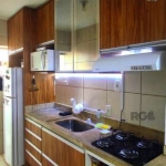 Apartamento 2 quartos no bairro Medianeira, reformado.  &lt;BR&gt;Cozinha, quartos e banheiro com móveis sob medida&lt;BR&gt;Ótima insolação, leste/norte.&lt;BR&gt;01 Vaga fixa.