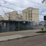 Apartamento no bairro Vila Nova, de 2 dormitórios, living para 2 ambientes, cozinha e banheiro social. Condomínio com portaria, quiosque com churrasqueira, mercado self-service, academia ao ar livre, 