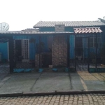 Linda casa no bairro Restinga, com 3 dormitórios, amplo living, cozinha, lavanderia em ambiente separado, coberta com iluminação natural, (claraboia), banheiro social com box,, vaga de garagem coberta