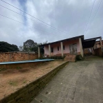 Ampla Casa térrea localizada  no bairro Restinga, Casa com 3 dormitórios, amplo living, cozinha, garagem coberta , patio todo murado, amplo patio na frente com varanda e piscina, patio nos fundos com 