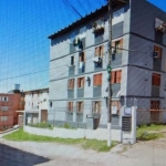 Apartamento 2 dormitórios , último andar , cozinha reformada, com balcão , banheiro social, quartos com piso frio , sala ampla, garagem fechada p 2 carros . Supermercado Oliveira, Próxima a Escola São