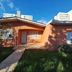 Casa na Rua Nilo Ruschel,  Morro Santana,  em terreno de esquina com área total de 285 m², 3 dormitórios, sala, cozinha, despensa, dois banheiros, área de serviço com tanque de alvenaria, área externa