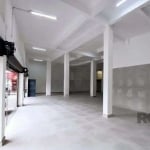 Libertas imobiliária vende loja na Av. Assis Brasil com 530m², sendo pavimento térreo com 430m², loja ampla, pé direito duplo, vitrine com cortinas metálicas automatizadas e 2 banheiros, mais mezanino