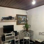 LIBERTAS Vende !   Casa com 2 dormitórios no Bairro Farrapos, living 2 ambientes amplos, cozinha e lavanderia com churrasqueira, banheiro, pátio nos fundos e na frente, vaga para 2 carros, piso cerami