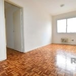 Libertas Imobiliária aluga apartamento com 69m² no bairro Menino Deus.&lt;BR&gt;&lt;BR&gt;Imóvel de 2 dormitórios, dependência, amplo living, piso em parquet, área de serviço fechada, ar condicionado,