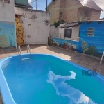 Casa com 4 quartos, suíte, vagas de garagem, piscina, hidromassagem, lareira, no bairro Aberta dos Morros, Porto Alegre/RS&lt;BR&gt;&lt;BR&gt;Casa ampla e bem planejada, ideal para famílias que buscam