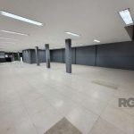 Libertas Imobiliária aluga loja comercial com 268m² no bairro Passo D'Areia.&lt;BR&gt;Imóvel com piso porcelanato, persiana de enrolar, porta de vidro Blindex na entrada, teto rebaixado de gesso com l