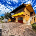 Casa com 2 salas comerciais, 3 quartos, vaga de garagem churrasqueira, suíte, no