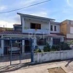 EXCELENTE CASA DE 4 DORMITÓRIOS NO BAIRRO PARTENON! Ampla casa no bairro Partenon, com 4 dormitórios, sendo 1 suíte com closet, 2 salas, sendo uma com lareira, 4 banheiros, 7 ar-condicionados, copa/co