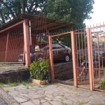 Ótimo terreno com imóvel para morar , no Bairro Nonoai, excelente para construtores que procuram investimentos ,  chalé de madeira , parte alvenaria , composto de garagem coberta, 02 dormitórios , liv