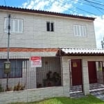 Linda casa em loteamento com acesso somente de moradores, com 2 dormitórios sendo uma suíte com sacada, amplo living, cozinha, lavabo, garagem coberta e fechada, quiosque nos fundos com churrasqueira 