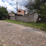 Excelente terreno de esquina, plano, em privilegiada localização, medindo 20,00m X 23,90m X 28,50m, com 2 casas de alvenaria, sendo uma pronta e a outra em acabamento.      &lt;BR&gt; Ótima opção para