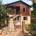 Casa de 4 dormitórios, sala  ampla, cozinha , banheiro social, patio amplo de 805,20m2, composto por arvores de sombra alem de variedade de flores.&lt;BR&gt;Imóvel bem localizado próximo a todas comod