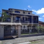 Vende - Linda e Grande casa semi mobiliada com Piscina Aquecida,  terraço, sacadas, suítes com closet, banheiros em mármore,  apartamento  nos fundos do imóvel no bairro Partenon em Porto Alegre,  4 v