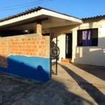 Casa no bairro Restinga com 2 dormitórios, amplo living, banheiro, garagem para dois carros,  sendo uma coberta edícula nos fundo em fase final de construção com mais um dormitório e uma banho com sal