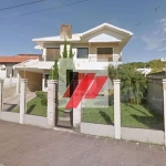 Casa com 4 dormitórios à venda, 309 m² por R$ 1.800.000,00 - Centro - Torres/RS