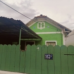 Terreno com 3 casa e terraço a venda em Bonsucesso.