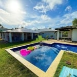 Casa térrea à venda em Lauro de Freitas: 374m², 6 quartos, 4 suítes, piscina, espaço gourmet, condomínio com lazer e segurança 24h na Estrada Coco