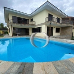 Maravilhosa casa frente mar, com 5 suítes, piscina e churrasqueira na Enseada