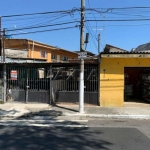 Terreno à venda com 3 casas mais uma loja ao nível da rua, na Vila Dionísia.