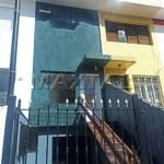 Casa comercial Alto de Santana, com 3 salas, 2 banheiros e 2 vagas, com fachada.