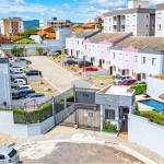 Casa de Vila com 2 Quartos e 2 Vagas de Garagem - Conforto e Lazer ao Seu Alcance