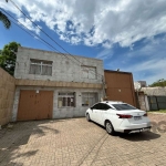 OPORTUNIDADE!&lt;BR&gt;   Prédio inteiro, em terreno medindo 1.021m2 de área escriturada. Localizado no bairro Glória, o imóvel possui edificação de 569m2, sendo estes divididos em dois pavilhões. &lt