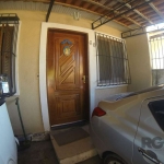 Casa à venda no bairro Hípica | O imóvel conta com 2 dormitórios sendo 1 suite, sala de estar e jantar, cozinha e banheiro social. Além de área gourmet com churrasqueira, mezanino e garagem coberta pa