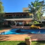 Casa de condomínio com 4 suítes à venda, 360 m²