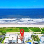 Sobrado em Condomínio de Frente para o Mar, com 3 dormitórios à venda, 108 m² por R$ 700.000 - Coroados - Guaratuba/PR