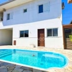 Casa com piscina,  6 dormitórios à venda, 290 m² por R$ 850.000 - Cohapar - Guaratuba/PR