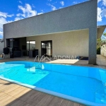 Casa com Piscina, 5 dormitórios à venda, 203 m² por R$ 1.350.000 - Nereidas - Guaratuba/PR