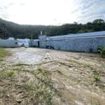 Terreno aterrado e murado na praia Massaguaçu