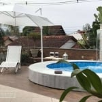 Casa com 4 dormitórios à venda, 293 m² por R$ 1.100.000 - Praia das Palmeiras - Caraguatatuba/SP