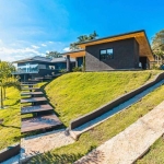 Casa luxuosa em condomínio fechado com 3 suítes, piscina, deck e área gourmet à venda em Bragança Paulista, 350 m² - Jardim das Palmeiras