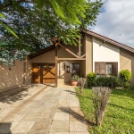 Casa 3 dormitórios sendo 1 suíte, 4 vagas,  lareira, pátio, piscina, à venda no bairro Nossa Senhora das Graças, Canoas. Aceita financiamento FGTS