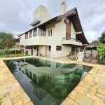 CASA ALTO PADRÃO, 4 DORMITÓRIOS, 4 SUÍTES, VAGA PARA 6 VEÍCULOS NO JARDIM DO LAGO/MARECHAL RONDON EM CANOAS.