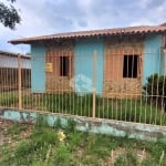 Casa com 2 dormitórios, sala cozinha, garagem para 1 carro coberta e mais 3 descobertas, em um terreno de 250² no Bairro Moinhos de Vento em canoas.