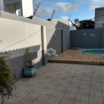 Casa  de 4 quartos, churrasqueira e piscina no bairro Harmonia  em Canoas RS