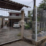 Casa a venda no centro de Canoas c/3 quartos. 2 banheiros