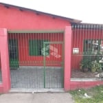 Casa com cinco dormitórios no bairro Aparecida em Alvorada-RS.